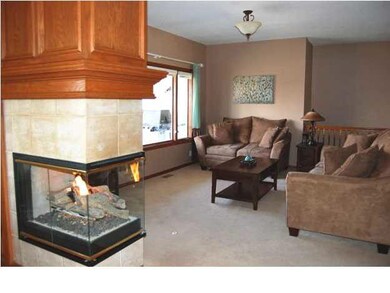 Another view of the living room with 3-way gas fir