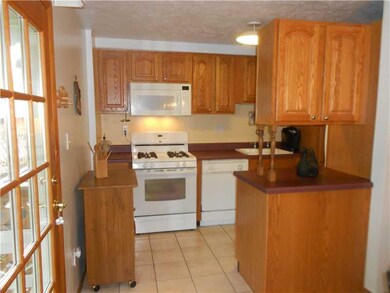 Exterior Front. Updated kitchen with oak cabinetry