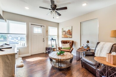 Living room featuring ceiling fan, recessed lighti