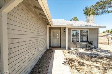 Covered front entry with security screen door welc