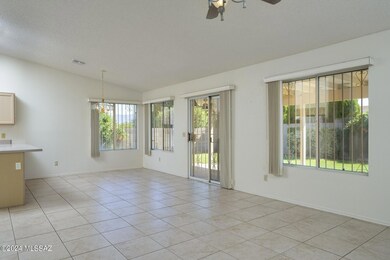 Dining Area overlooks backyard.