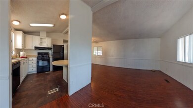 View of Living Area & Kitchen from entry