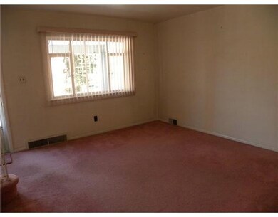 Living Room. The living room offers a large window