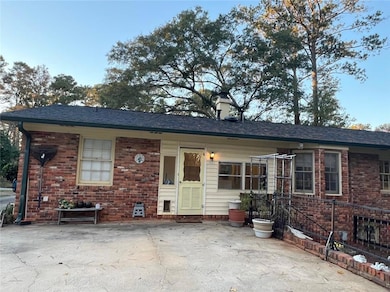 Ranch-style house featuring a patio