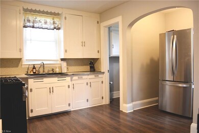 To the right of the closet now houses the refriger
