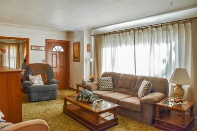 The living room has plenty of natural light!