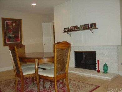 Family Room/Dining Area shares the dual sided fire