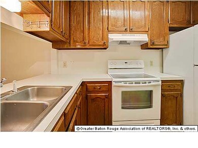 Kitchen includes a refrigerator and newer dishwash