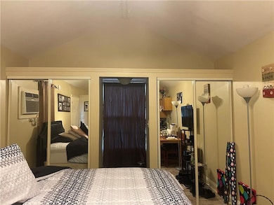 Combination living/bedroom...cozy and cute.