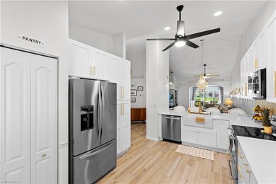 Quartz counter tops and soft close white cabinets 
