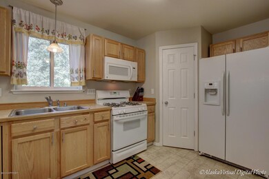 Kitchen W/Oak Cabinets & Pantry