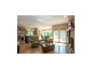 Very Nice Open Kitchen and Hearth Room with Granite Counters and Updated Stove and Microwave!