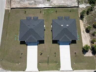 1267 Hillcrest St E, Lehigh Acres, FL 33974 - photo 2