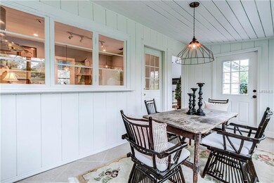 Dining Room Opens to Kitchen and Living Room