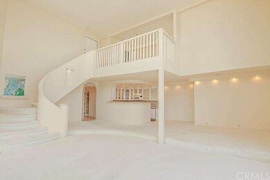 Stunning sweeping staircase that leads to the loft