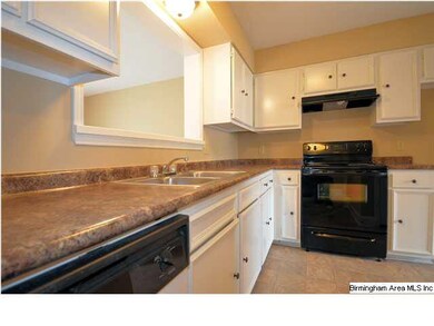 Kitchen has new counter tops and a conversation wi