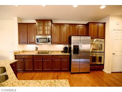 Kitchen - Upgraded kitchen features double ovens, 