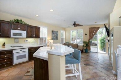 Spacious kitchen with raised island seating, open 