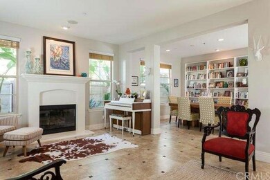 Living room opens up to dining room with stunning 