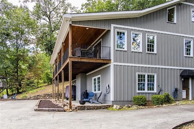 View of side of home with a patio