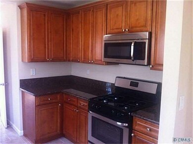 Granite And Stainless Kitchen