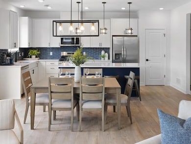 This elegant dining room seamlessly opens to the kitchen, creating an ideal space for both formal and casual dining. With ample room and thoughtful design, it’s perfect for entertaining. *selections may vary from images