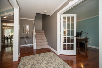 Large Entry with view into private office on the r