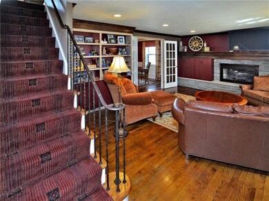 FORMAL LIVING RM, WOOL CARPETED STAIRS