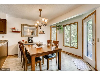 Dining area has a door out the backyard deck conve