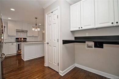 Convenient laundry nook off the back entry.