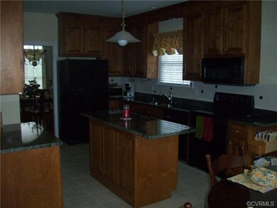 Open Kitchen with Granite Countertops & Island