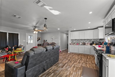 Kitchen featuring hardwood / wood-style floors, bl