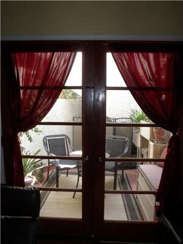French doors from living room to patio.