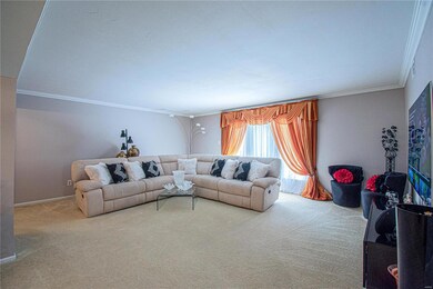 LIVING ROOM - EXTITS TO BALCONY