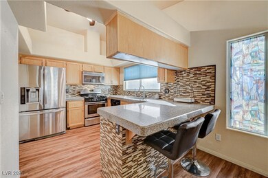 Kitchen featuring appliances with stainless steel