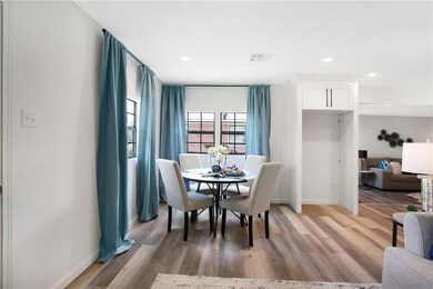Dining Area is open to Den, Kitchen and Living Roo