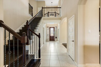This photo showcases a spacious and elegant entryw