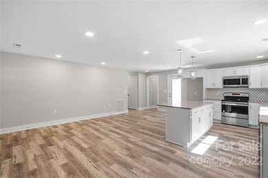 406 High St, Lowell, NC 28098 - photo 3