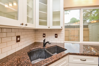 Kitchen also features a deep double sink