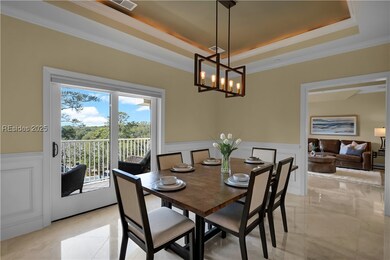 Dining Room with crown moulding, ten foot ceilings