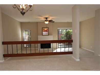 Dining Room overlooks the Living Room.