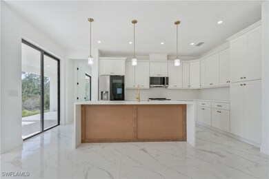 Kitchen featuring appliances with stainless steel