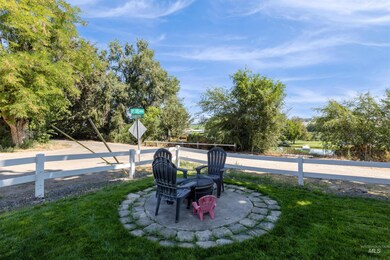 View of yard with a fire pit and a patio area