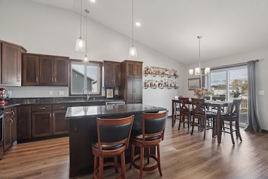 Modern kitchen with stainless steel appliances and granite countertops