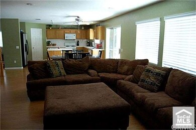 Check out the size of the living room and open Kit