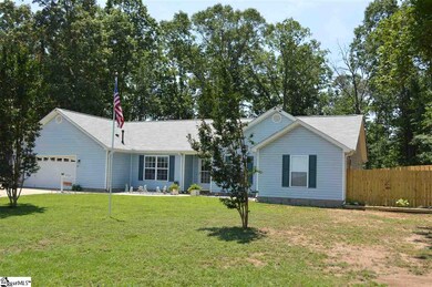 Front with attached 2 car garage