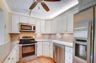 Updated kitchen with Quartz counters, tile backspl