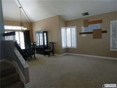 Living room from entry looking into dining room