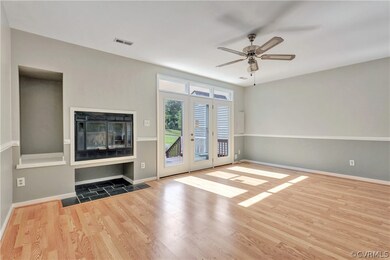 Great Room W/Fireplace & New Triple French Doors!