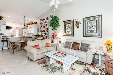 Living room with recessed lighting, lofted ceiling